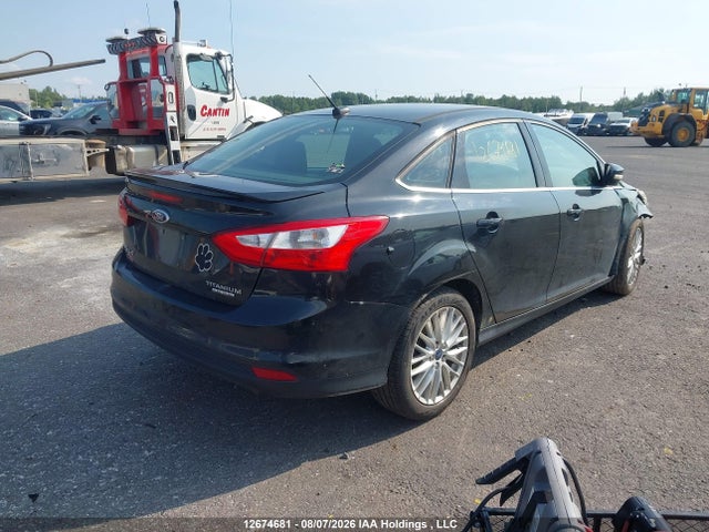 12674681 :رقم المزاد ، 1FADP3J24DL293202 vin ، 2013 Ford Focus Titanium مزاد بيع