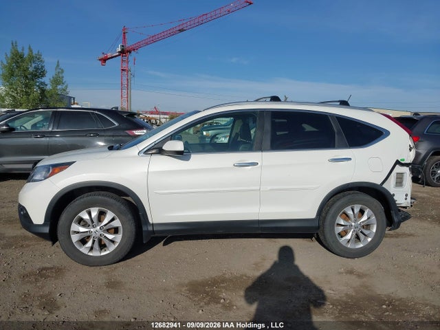 2014 Honda Cr-v Touring მანქანა იყიდება აუქციონზე, vin: 2HKRM4H92EH112380, აუქციონის ნომერი: 12682941