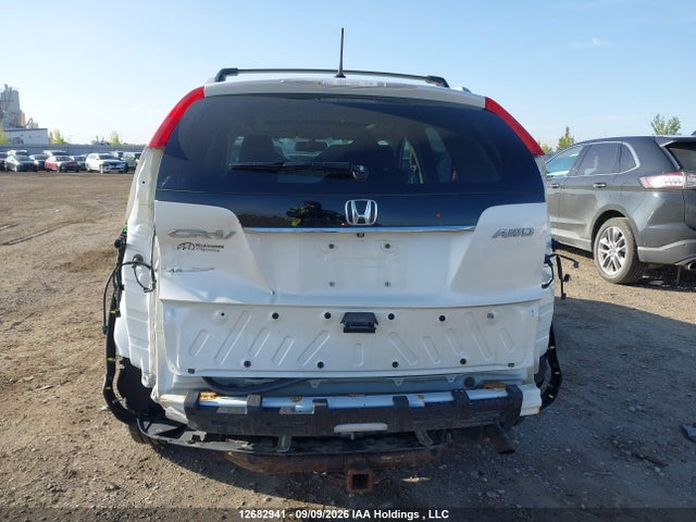 2014 Honda Cr-v Touring მანქანა იყიდება აუქციონზე, vin: 2HKRM4H92EH112380, აუქციონის ნომერი: 12682941