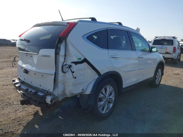 2014 Honda Cr-v Touring მანქანა იყიდება აუქციონზე, vin: 2HKRM4H92EH112380, აუქციონის ნომერი: 12682941