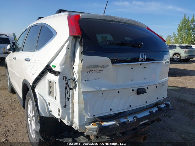 2014 Honda Cr-v Touring მანქანა იყიდება აუქციონზე, vin: 2HKRM4H92EH112380, აუქციონის ნომერი: 12682941