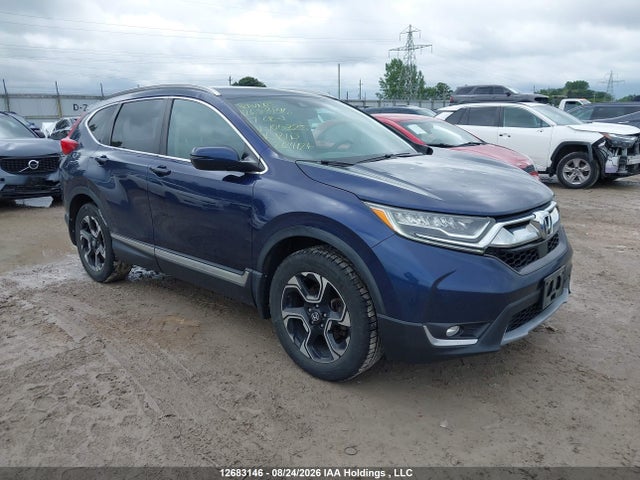 Honda Cr-v Touring 2017 2HKRW2H97HH100325 головне зображення