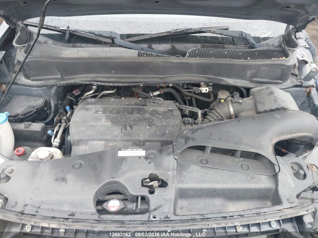 2011 Honda Pilot Touring მანქანა იყიდება აუქციონზე, vin: 5FNYF4H95BB504155, აუქციონის ნომერი: 12683162