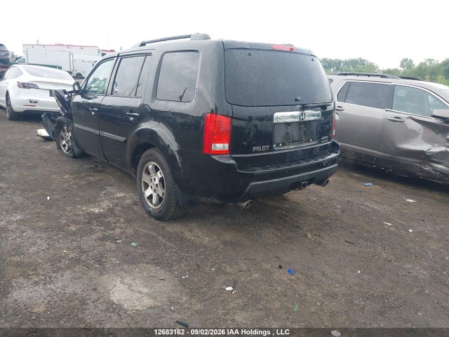 2011 Honda Pilot Touring მანქანა იყიდება აუქციონზე, vin: 5FNYF4H95BB504155, აუქციონის ნომერი: 12683162