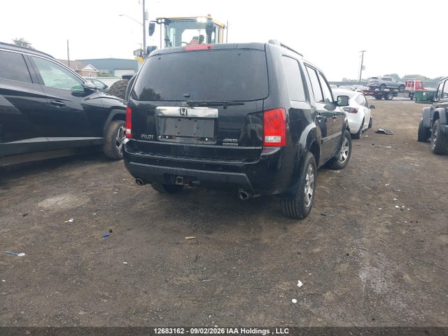 2011 Honda Pilot Touring მანქანა იყიდება აუქციონზე, vin: 5FNYF4H95BB504155, აუქციონის ნომერი: 12683162