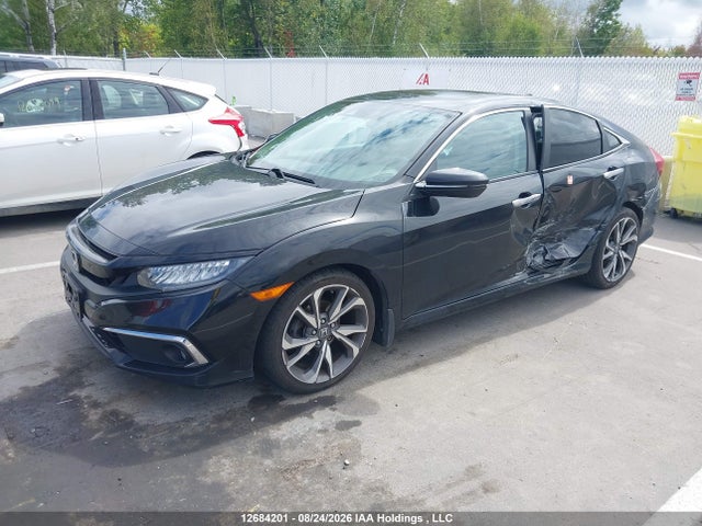 Honda Civic Touring 2019 2HGFC1F95KH104593 Image 2