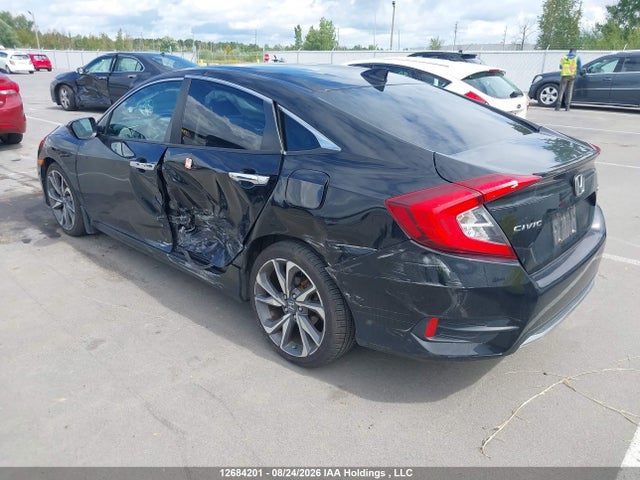 Honda Civic Touring 2019 2HGFC1F95KH104593 Image 3