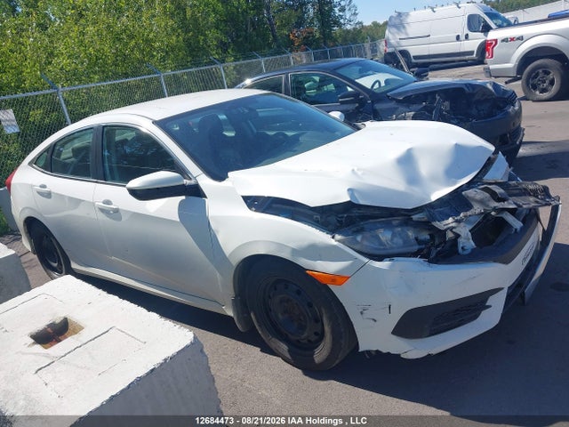 Продажа на аукционе авто 2017 Honda Civic Lx, vin: 2HGFC2F52HH038211, номер лота: 12684473