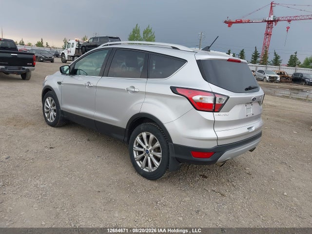 2018 Ford Escape Titanium მანქანა იყიდება აუქციონზე, vin: 1FMCU9J93JUB17984, აუქციონის ნომერი: 12684671