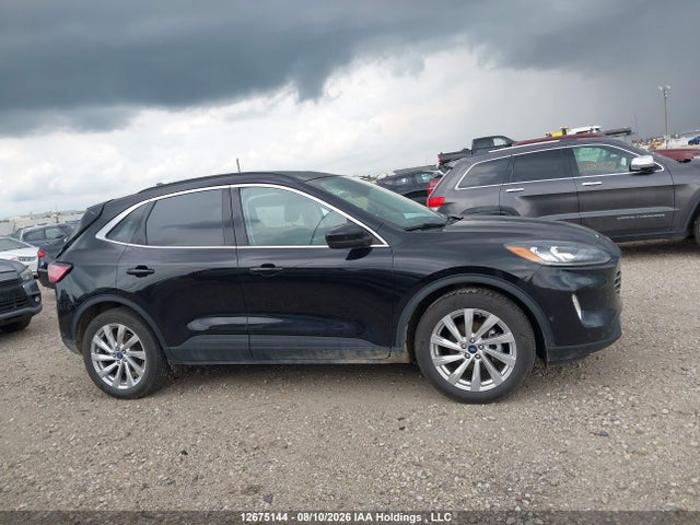 2021 Ford Escape Titanium Hybrid მანქანა იყიდება აუქციონზე, vin: 1FMCU9DZXMUA58898, აუქციონის ნომერი: 12675144