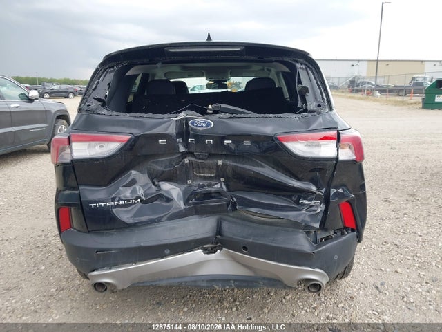2021 Ford Escape Titanium Hybrid მანქანა იყიდება აუქციონზე, vin: 1FMCU9DZXMUA58898, აუქციონის ნომერი: 12675144