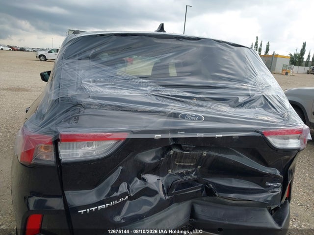 2021 Ford Escape Titanium Hybrid მანქანა იყიდება აუქციონზე, vin: 1FMCU9DZXMUA58898, აუქციონის ნომერი: 12675144