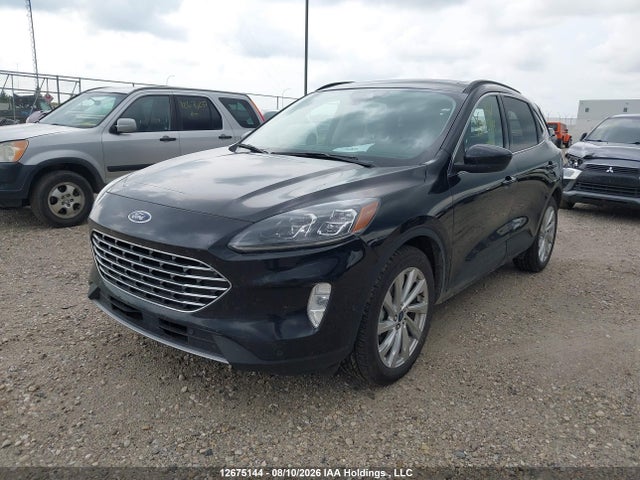 2021 Ford Escape Titanium Hybrid მანქანა იყიდება აუქციონზე, vin: 1FMCU9DZXMUA58898, აუქციონის ნომერი: 12675144