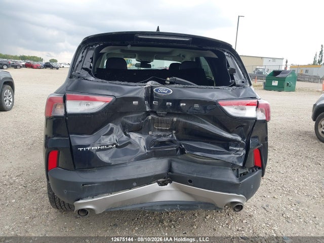 2021 Ford Escape Titanium Hybrid მანქანა იყიდება აუქციონზე, vin: 1FMCU9DZXMUA58898, აუქციონის ნომერი: 12675144