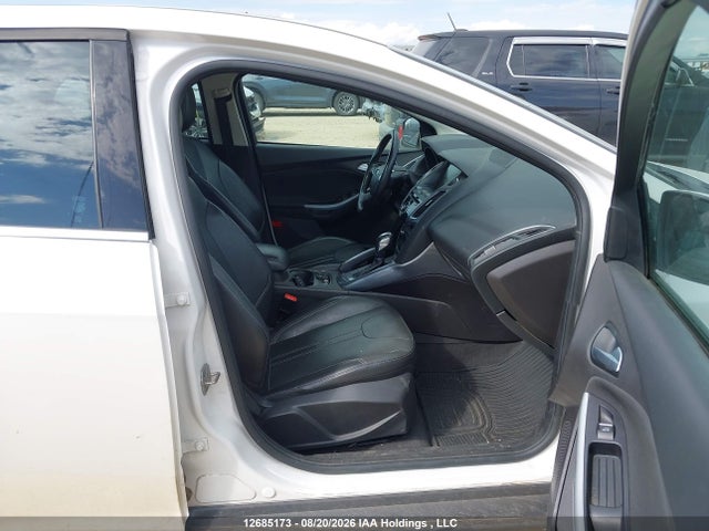 Продаж на аукціоні авто 2013 Ford Focus Titanium, vin: 1FADP3J2XDL366038, номер лоту: 12685173
