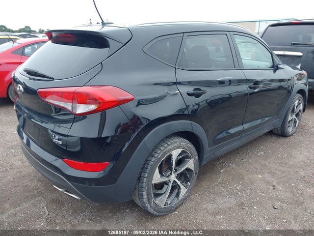 Hyundai Tucson Premium 1.6 2016 KM8J3CA29GU054344 Image 4