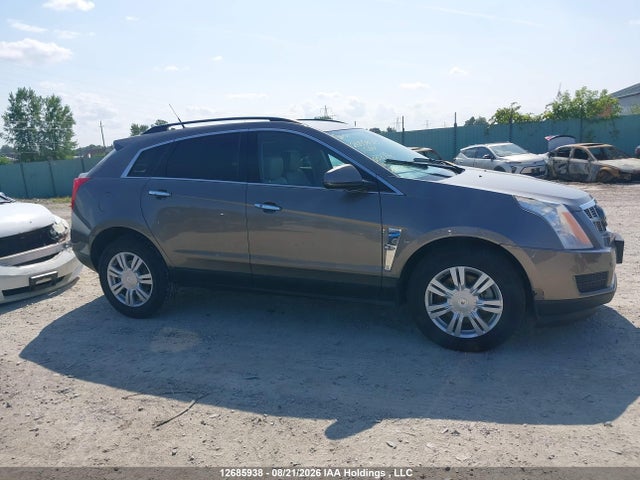 12685938 :رقم المزاد ، 3GYFNHEY2BS656716 vin ، 2011 Cadillac Srx مزاد بيع