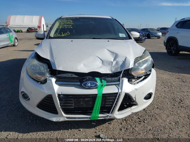 Auction sale of the 2012 Ford Focus Titanium, vin: 1FAHP3J21CL180596, lot number: 12686146