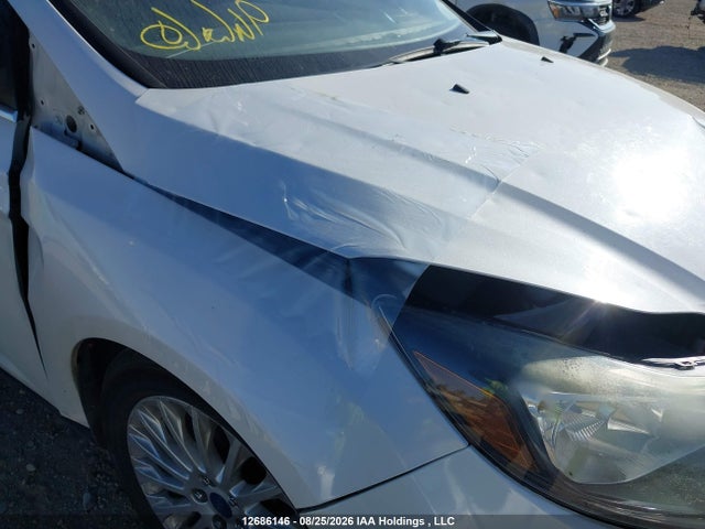Auction sale of the 2012 Ford Focus Titanium, vin: 1FAHP3J21CL180596, lot number: 12686146