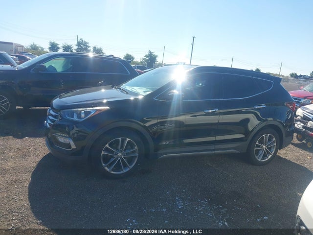 12686180 :رقم المزاد ، 5XYZUDLA3HG427332 vin ، 2017 Hyundai Santa Fe Sport مزاد بيع