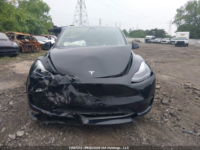 Tesla Model Y 2023 LRWYGDEE3PC162740 Image 6