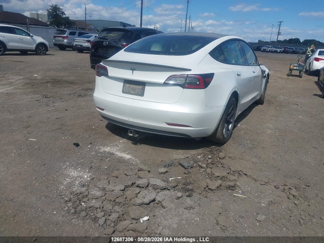 2021 Tesla Model 3 Standard Range/standard Range Plus მანქანა იყიდება აუქციონზე, vin: 5YJ3E1EA3MF977937, აუქციონის ნომერი: 12687306