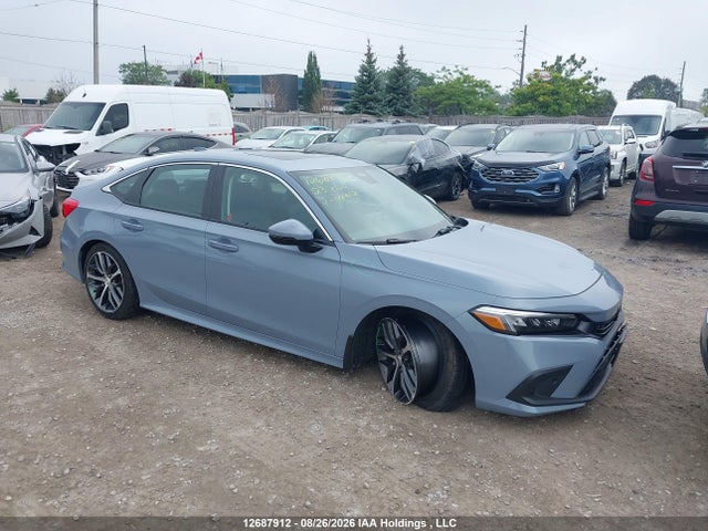 2023 Honda Civic Touring მანქანა იყიდება აუქციონზე, vin: 2HGFE1F95PH001658, აუქციონის ნომერი: 12687912