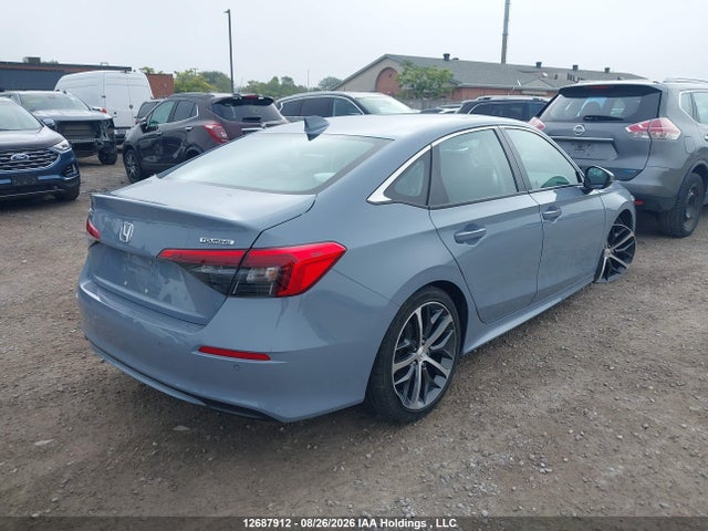 12687912 :رقم المزاد ، 2HGFE1F95PH001658 vin ، 2023 Honda Civic Touring مزاد بيع