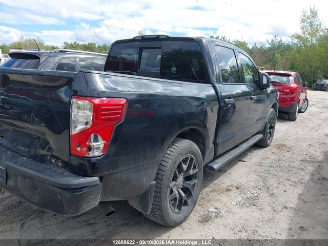 12688622 :رقم المزاد ، 1N6AA1E59JN518556 vin ، 2018 Nissan Titan Platinum/pro-4x/s/sl Midnight Edition/sv/sv Midnight Edition مزاد بيع