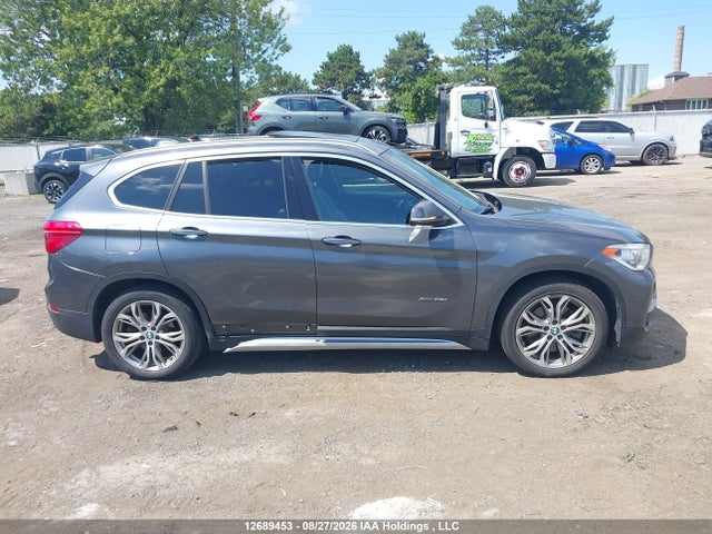 12689453 :رقم المزاد ، WBXHT3C39H5F72531 vin ، 2017 Bmw X1 Xdrive28i مزاد بيع