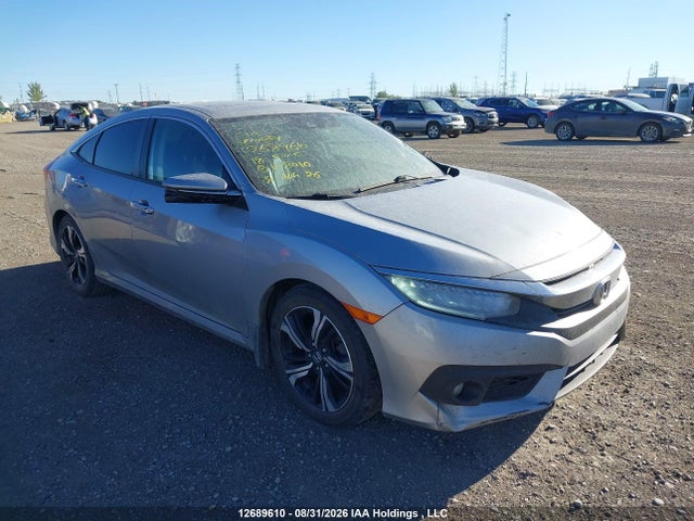 Honda Civic Touring 2018 2HGFC1F9XJH108010 головне зображення