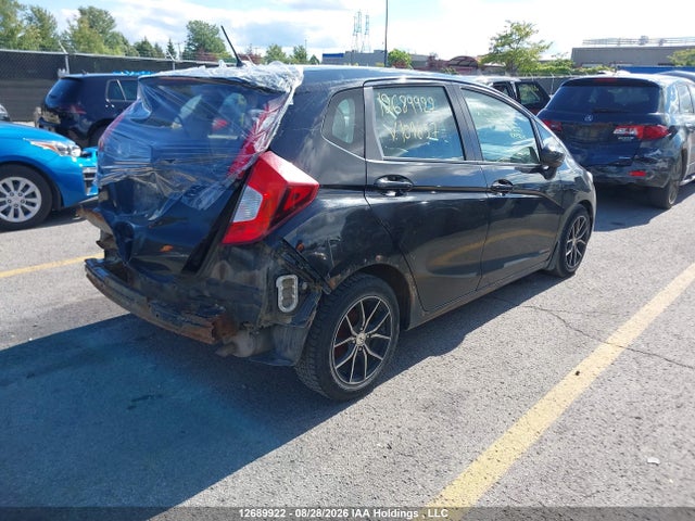 Honda FIT LX 2015 3HGGK5H58FM109657 Image 4
