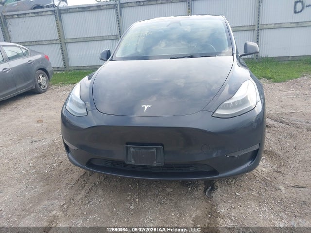 2024 Tesla Model Y Long Range/rwd მანქანა იყიდება აუქციონზე, vin: 7SAYGDEDXRF990111, აუქციონის ნომერი: 12690064