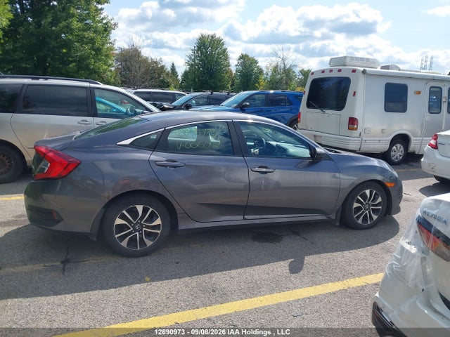 2HGFC2F57GH006059 Honda Civic Lx
