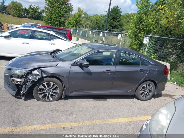 2HGFC2F57GH006059 Honda Civic Lx