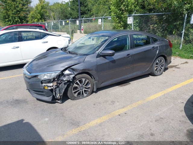 2HGFC2F57GH006059 Honda Civic Lx