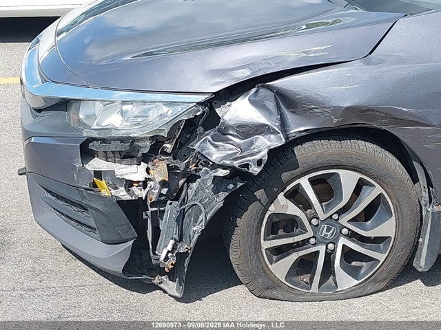 2HGFC2F57GH006059 Honda Civic Lx