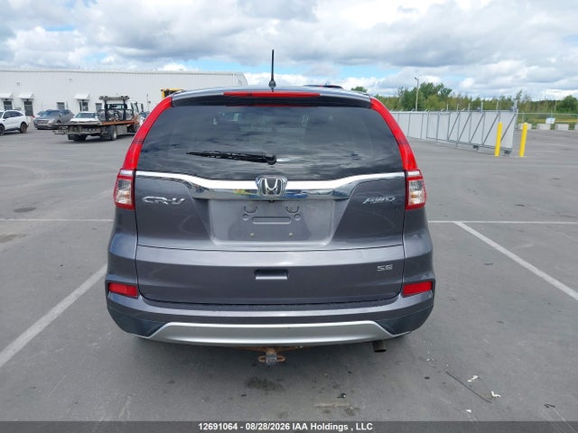 2HKRM4H46GH120537 Honda CR-V SE