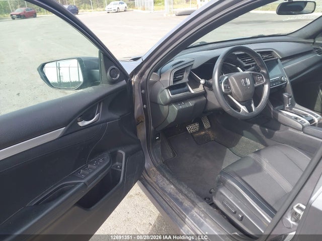 2019 Honda Civic Sport მანქანა იყიდება აუქციონზე, vin: 2HGFC2F86KH013118, აუქციონის ნომერი: 12691351