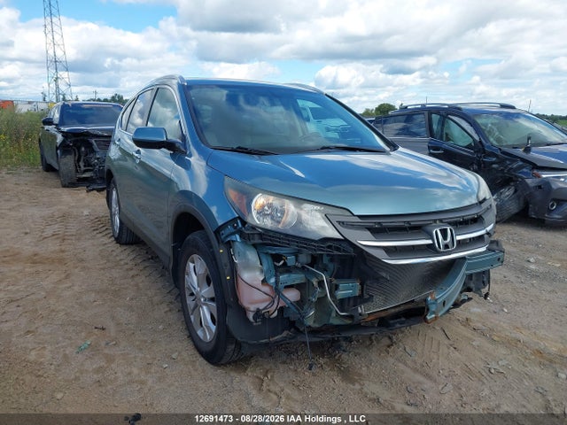 2014 Honda Cr-v Touring მანქანა იყიდება აუქციონზე, vin: 2HKRM4H94EH112994, აუქციონის ნომერი: 12691473