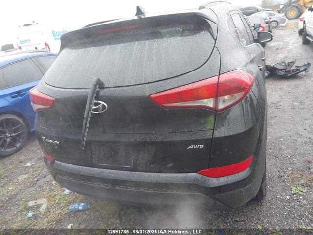 KM8J3CA4XGU245904 Hyundai Tucson Luxury