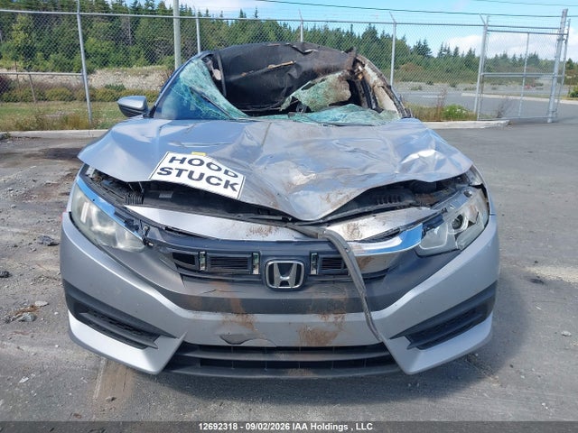 2HGFC2F51GH025965 Honda Civic Lx