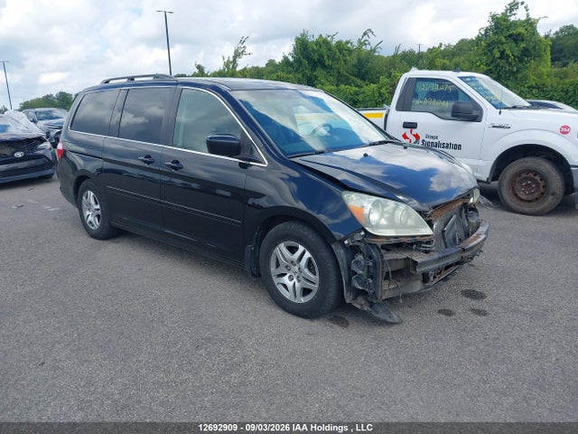 12692909 :رقم المزاد ، 5FNRL38885B511037 vin ، 2005 Honda Odyssey Touring مزاد بيع