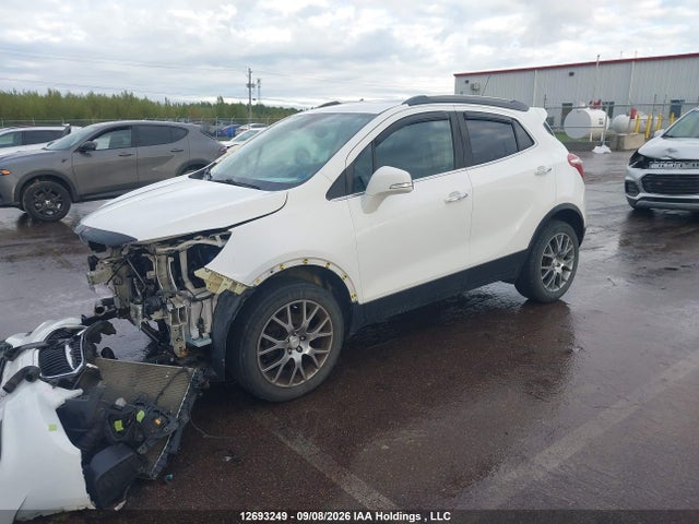 12693249 :رقم المزاد ، KL4CJ2SB1JB518560 vin ، 2018 Buick Encore Sport Touring مزاد بيع