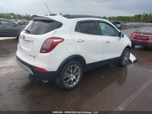 12693249 :رقم المزاد ، KL4CJ2SB1JB518560 vin ، 2018 Buick Encore Sport Touring مزاد بيع