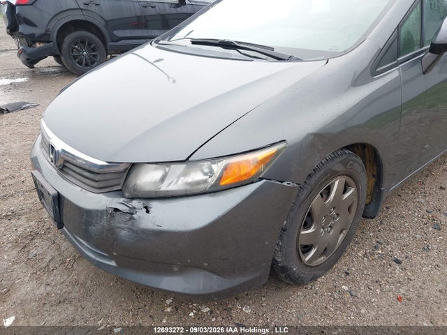 Продажа на аукционе авто 2012 Honda Civic Lx, vin: 2HGFB2F42CH058199, номер лота: 12693272
