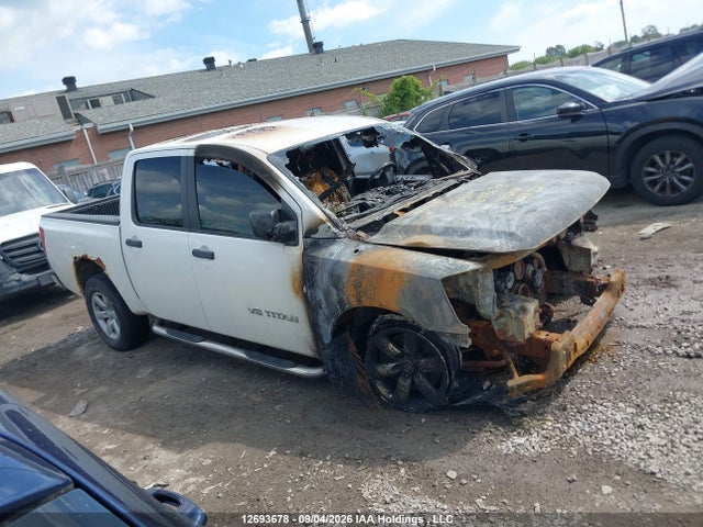 12693678 :رقم المزاد ، 1N6AA0EJ0AN306992 vin ، 2010 Nissan Titan Xe/se/le/pro-4x مزاد بيع