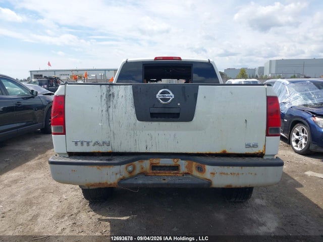 12693678 :رقم المزاد ، 1N6AA0EJ0AN306992 vin ، 2010 Nissan Titan Xe/se/le/pro-4x مزاد بيع