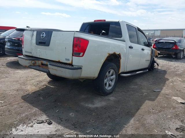 12693678 :رقم المزاد ، 1N6AA0EJ0AN306992 vin ، 2010 Nissan Titan Xe/se/le/pro-4x مزاد بيع