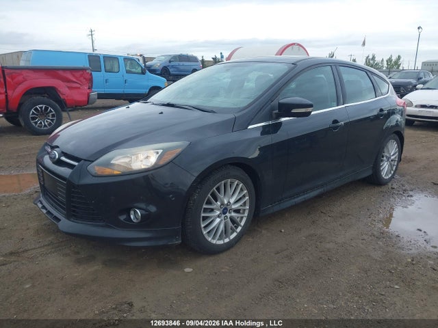 12693846 :رقم المزاد ، 1FADP3N21EL261321 vin ، 2014 Ford Focus Titanium مزاد بيع